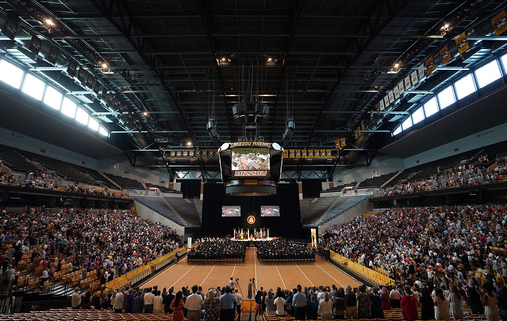 Journalism students and parents sing MU's alma mater song, "Old Missouri"